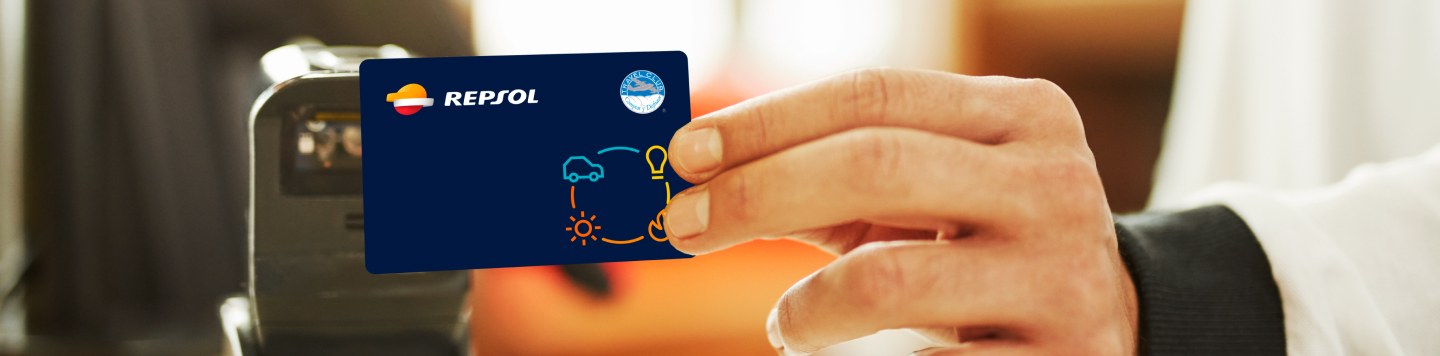 A person using the Repsol Travel card