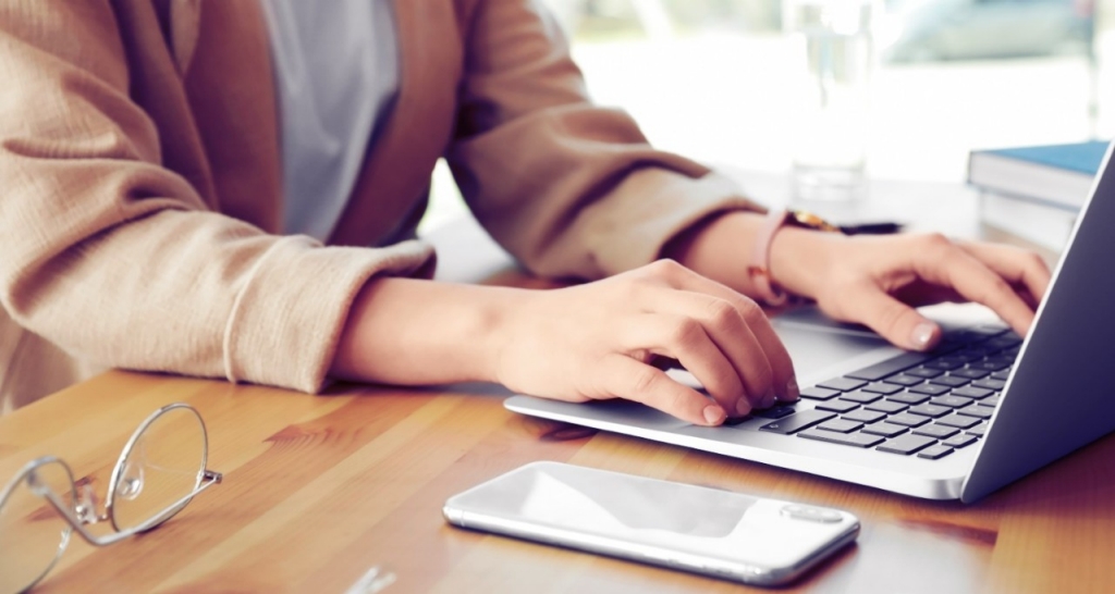An employee working on her computer
