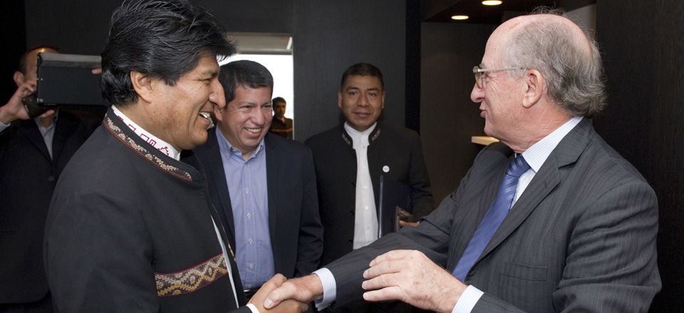 President of Bolivia, Evo Morales, and Repsol Chairman, Antonio Brufau shaking hands 