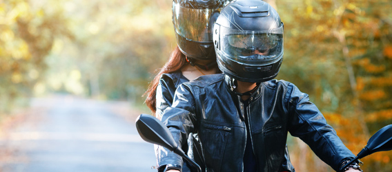 Two people on a motorcycle