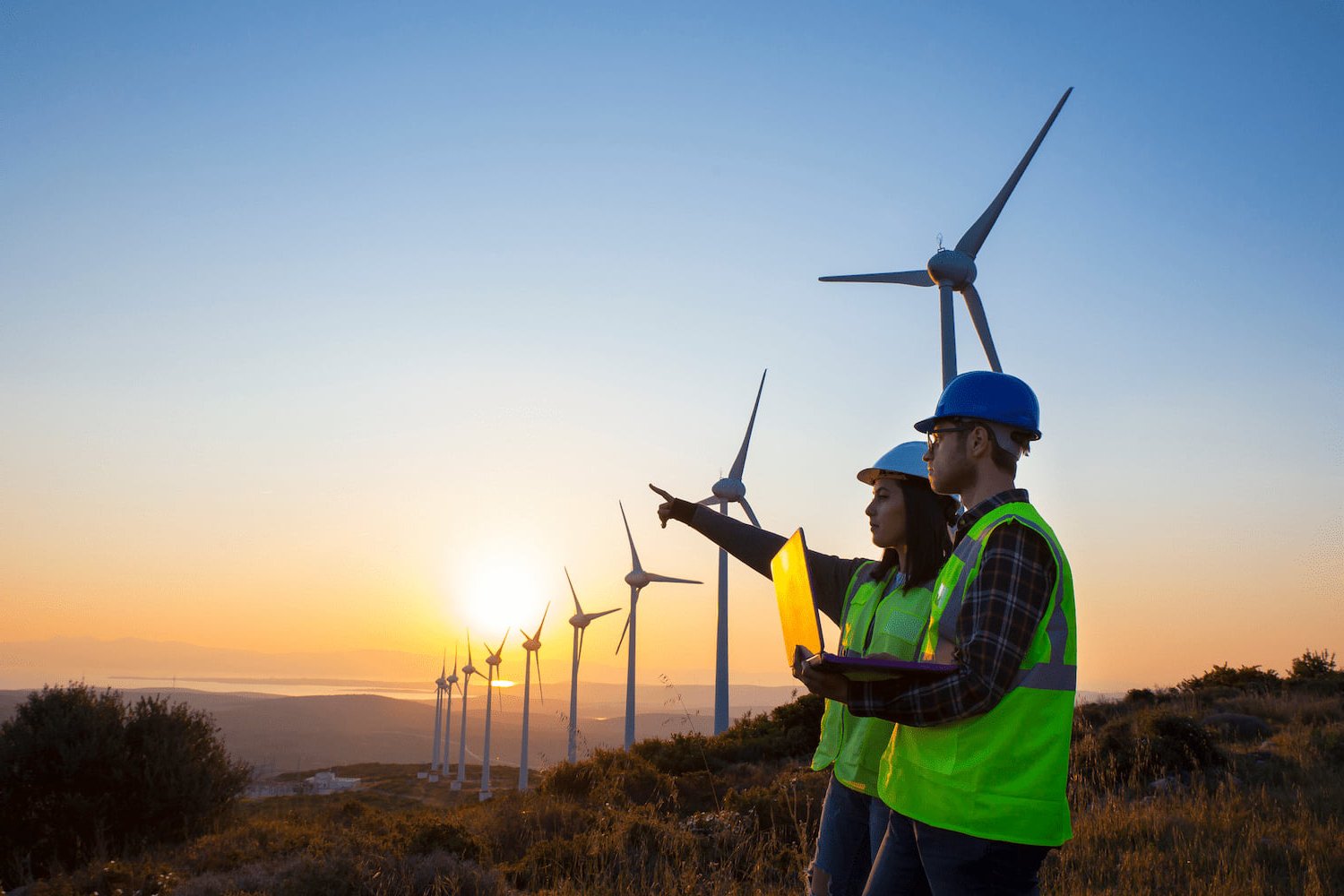 Two technicians at a wind farm