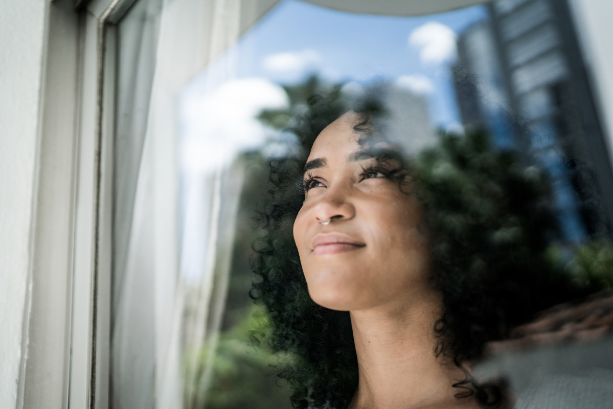A woman looking out the window