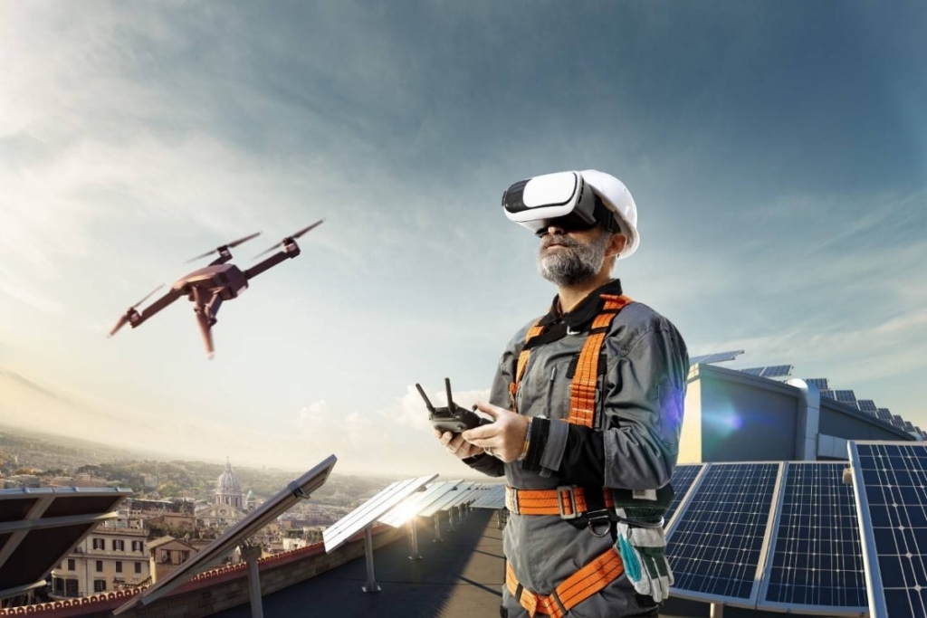 A person operating a drone at a solar facility