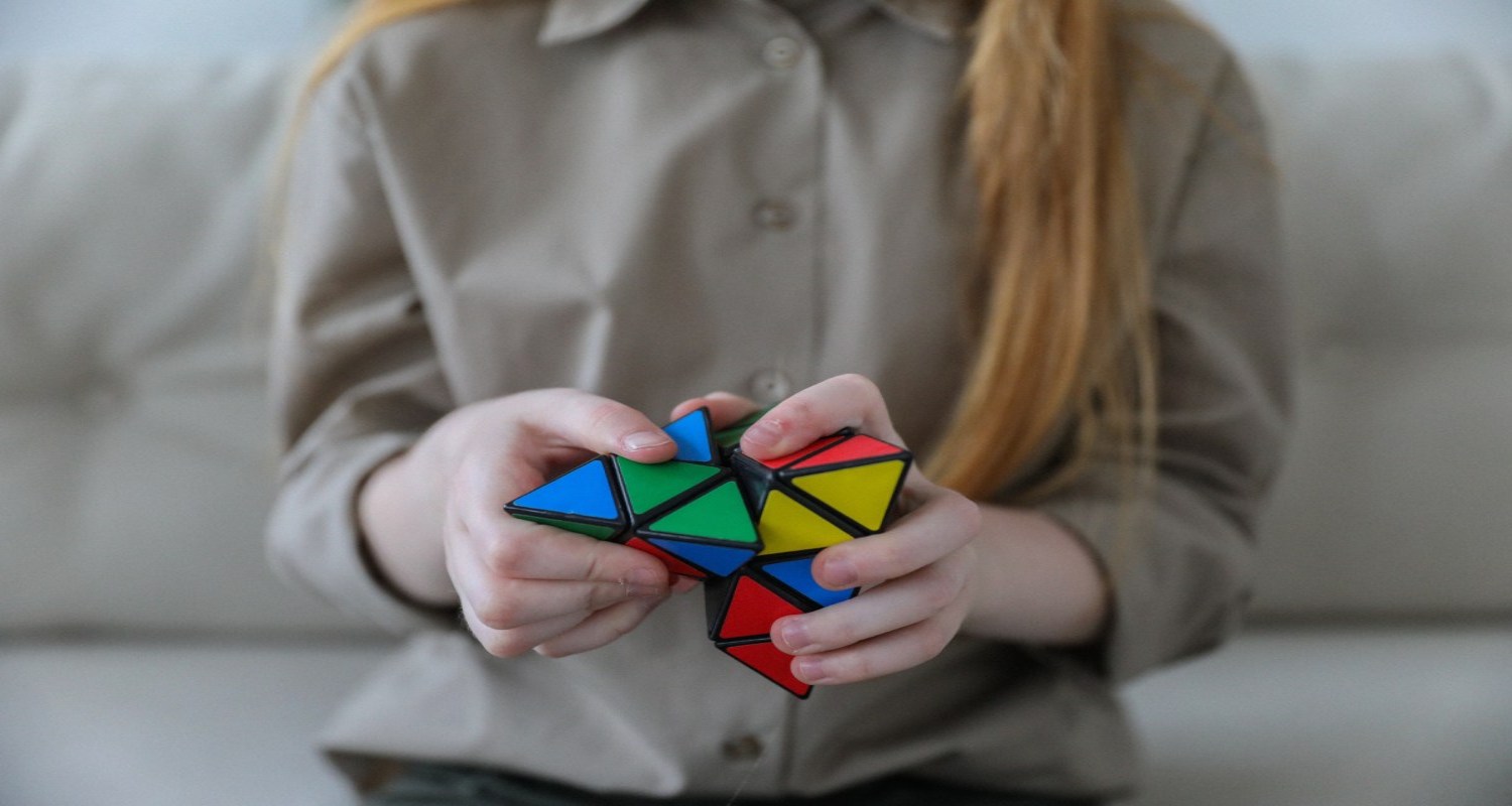 A woman with a puzzle in her hands