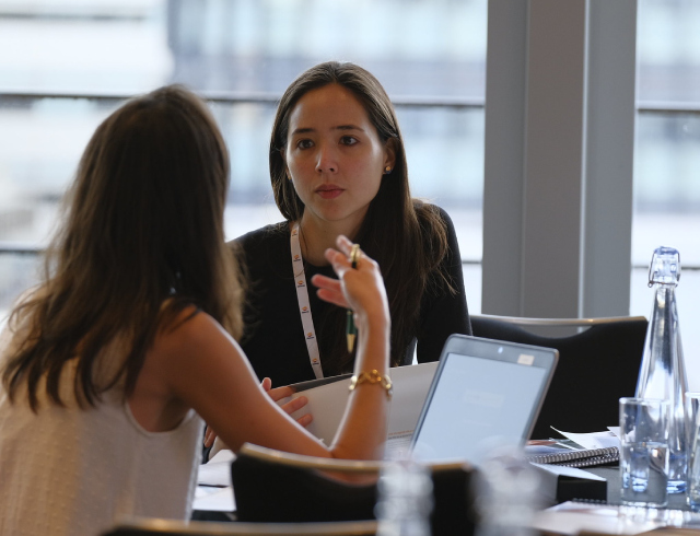 Two women talking in an office