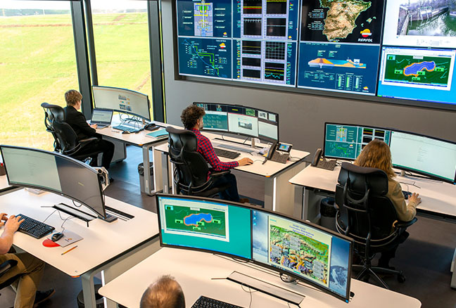 People working in a control room