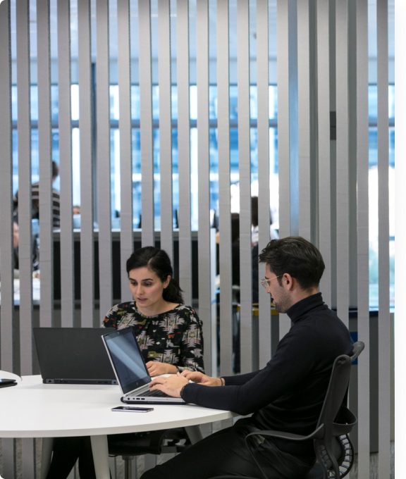 two people working at a table