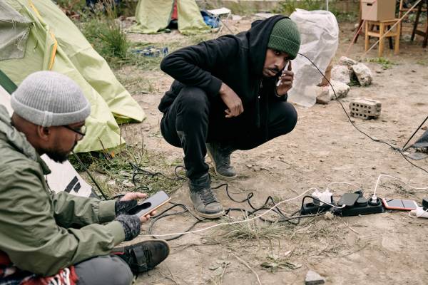 two men without access to the Internet, a type of digital divide