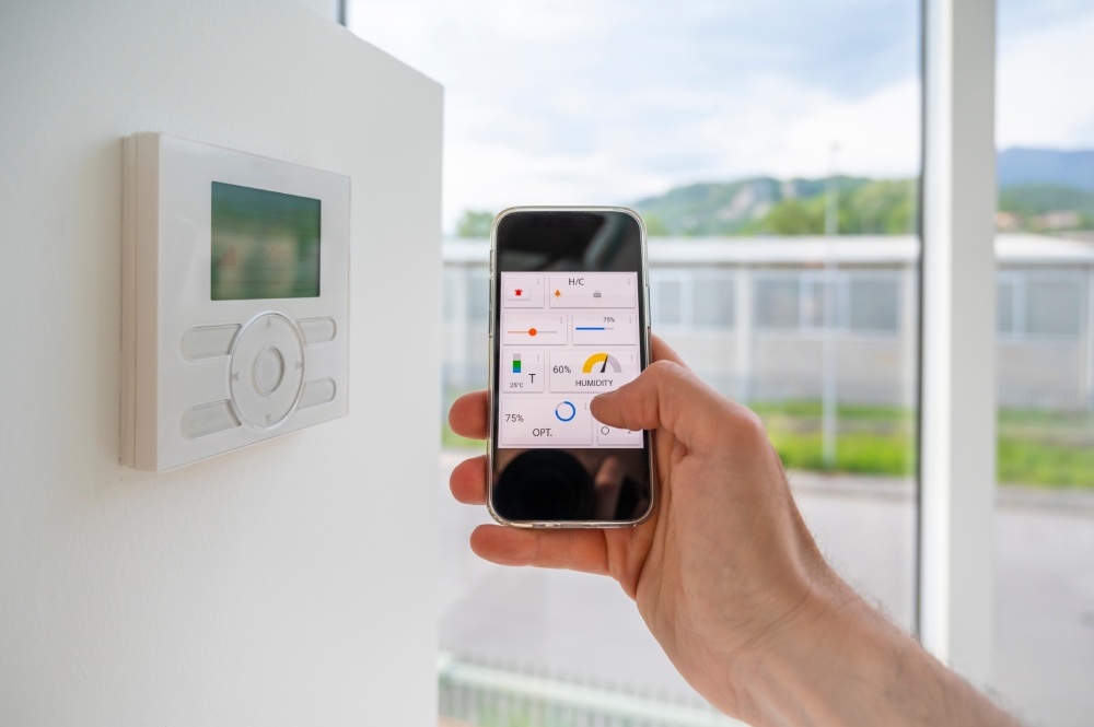 A smartphone being used to control a smart home