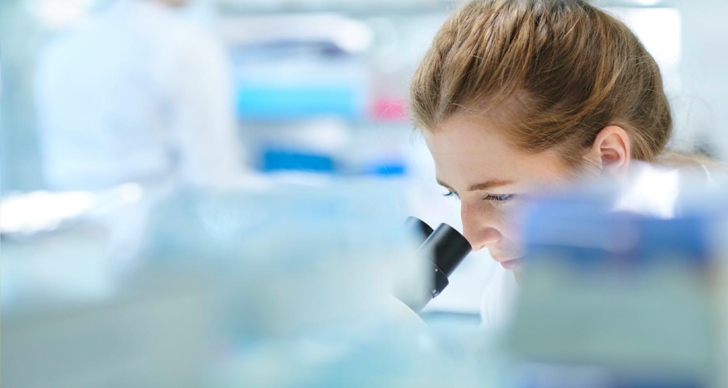 A man with virtual reality goggles and earphones