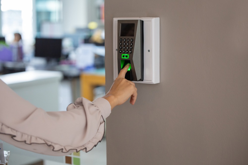 A person using a fingerprint scanner