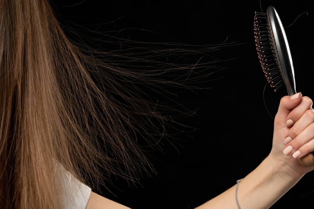 static electricity between hair and a brush