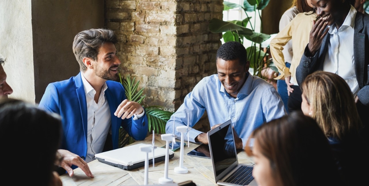 a group of people in a meeting