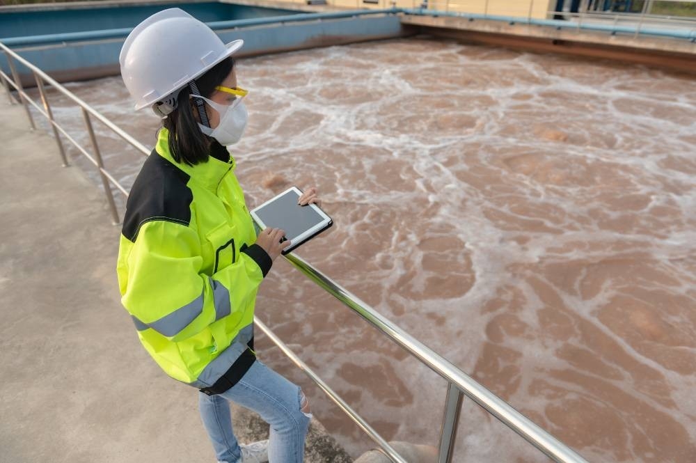 Operator inspecting a water source