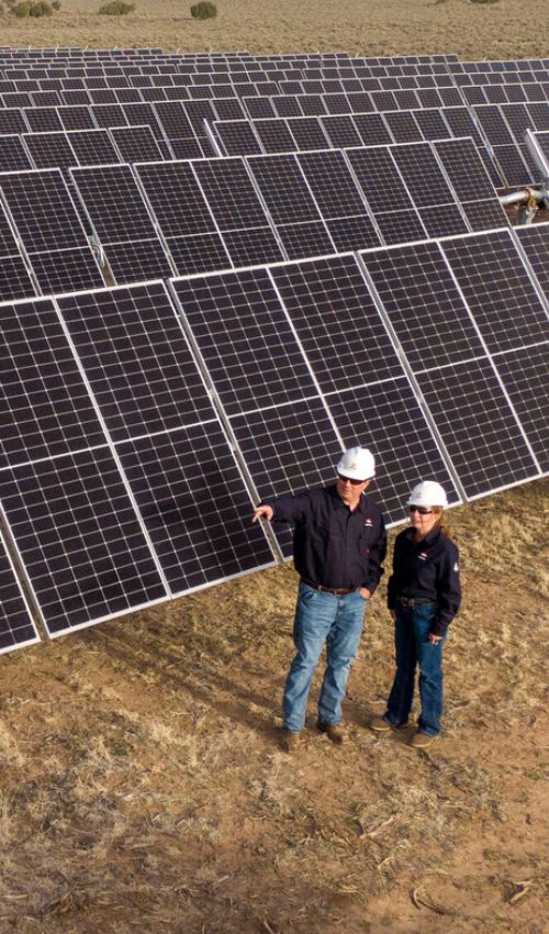Operators observing solar panels