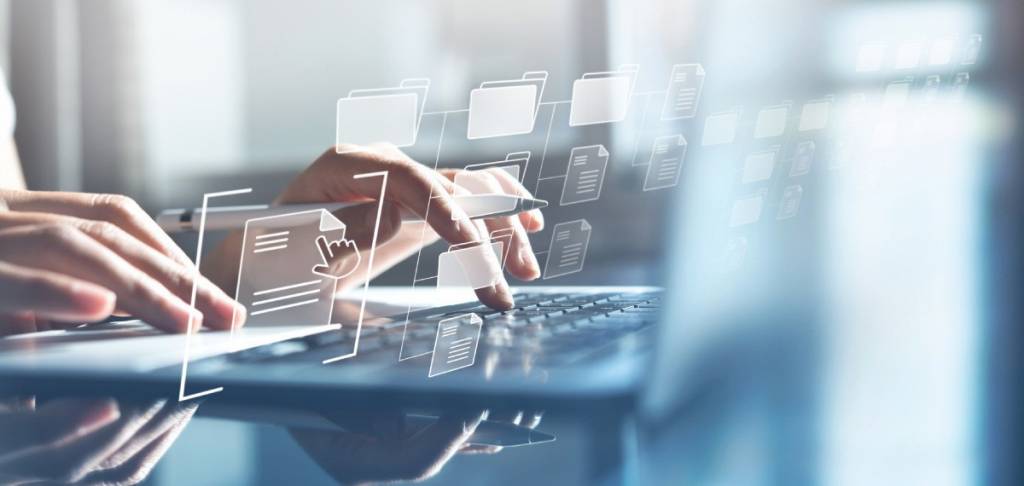 Close-up of a hands typing on a laptop