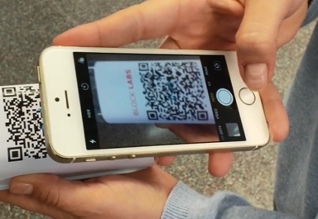 QR code being scanned with a smartphone