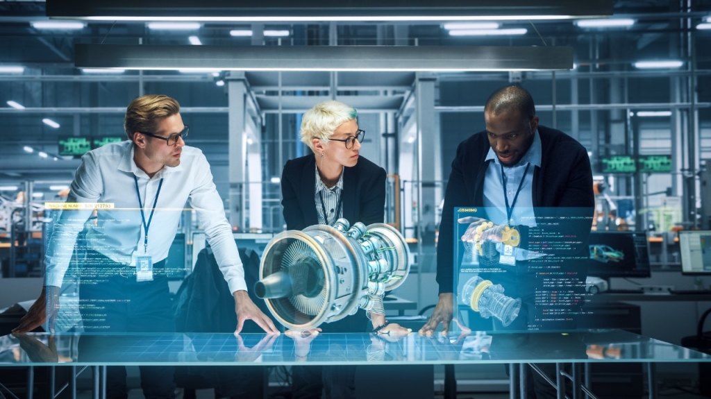Several people gathered in a technological environment