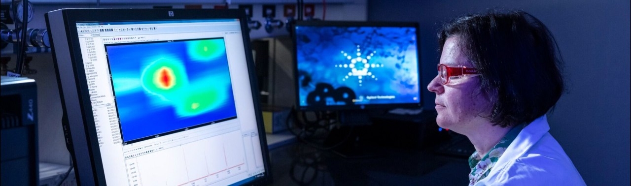 Technologist in front of computer