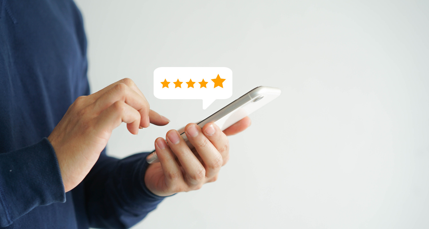 Detail of a person's hands giving a rating on a smartphone