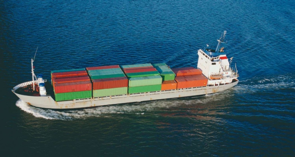 A shipping vessel transporting goods at high sea