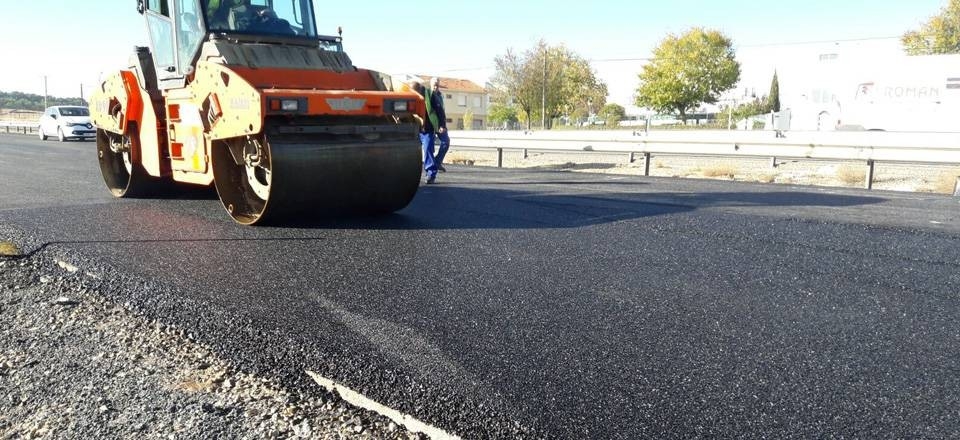Long Life Emulsions. Machinery working on the road
