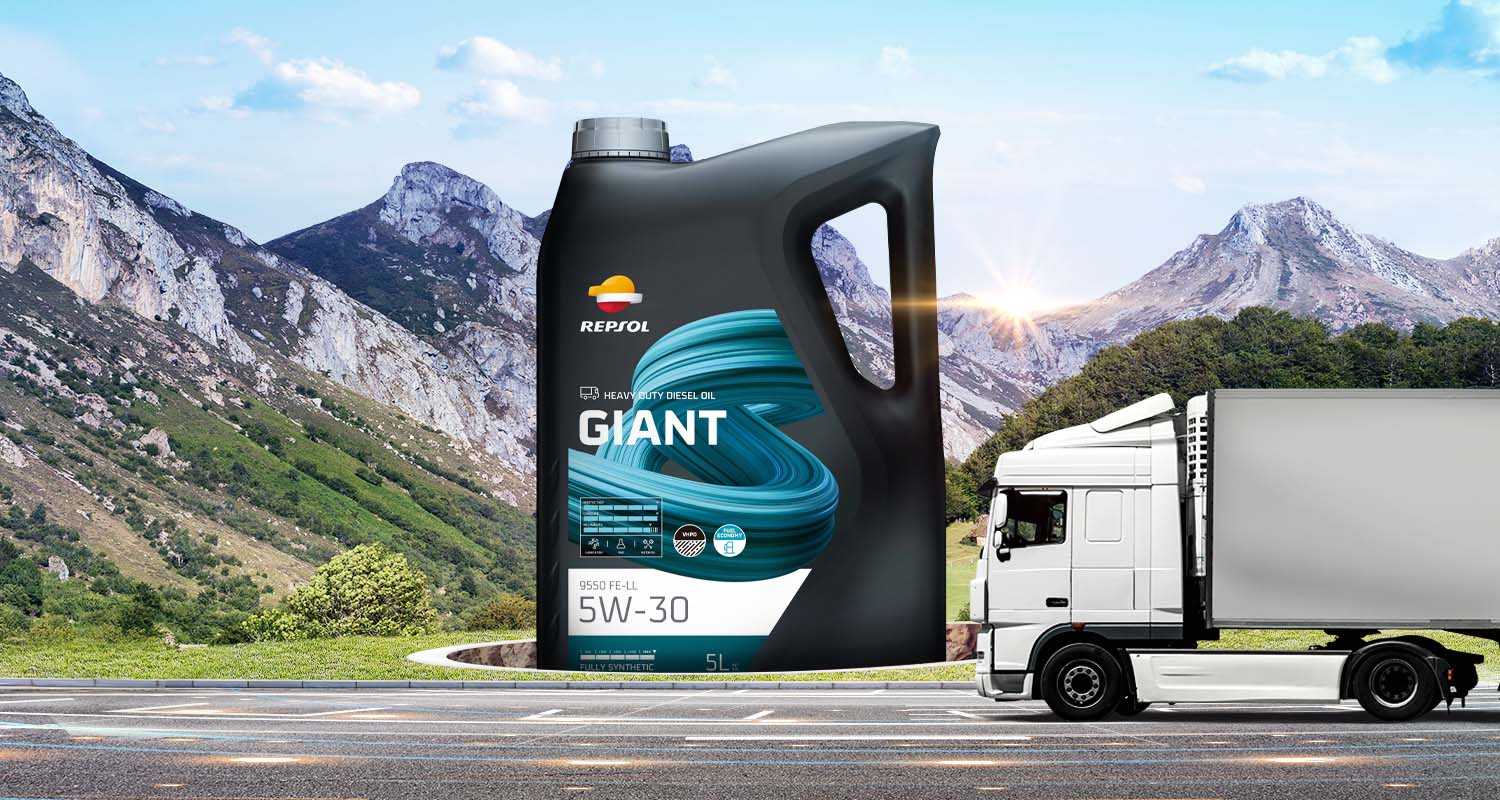 A truck driving on a mountainous highway with a superimposed Giant lubricant container 