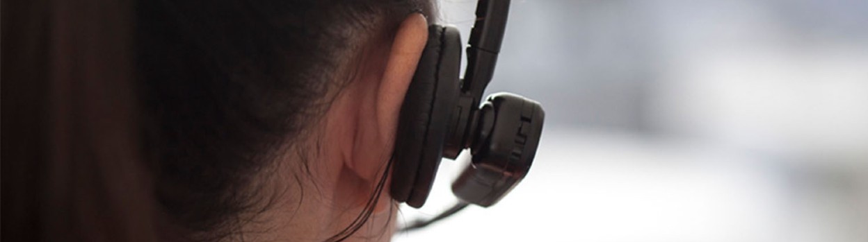 View of a customer service operator with a headset