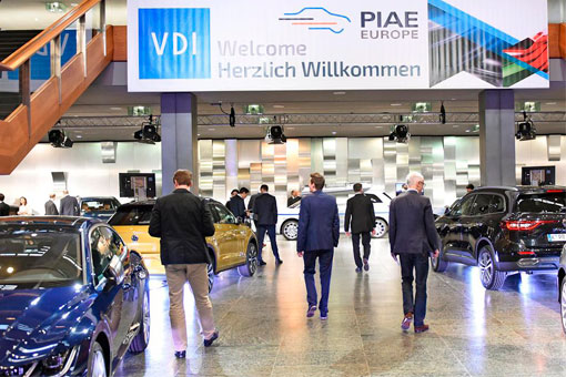 View of people looking at a group of cars at the VDI PIAE event