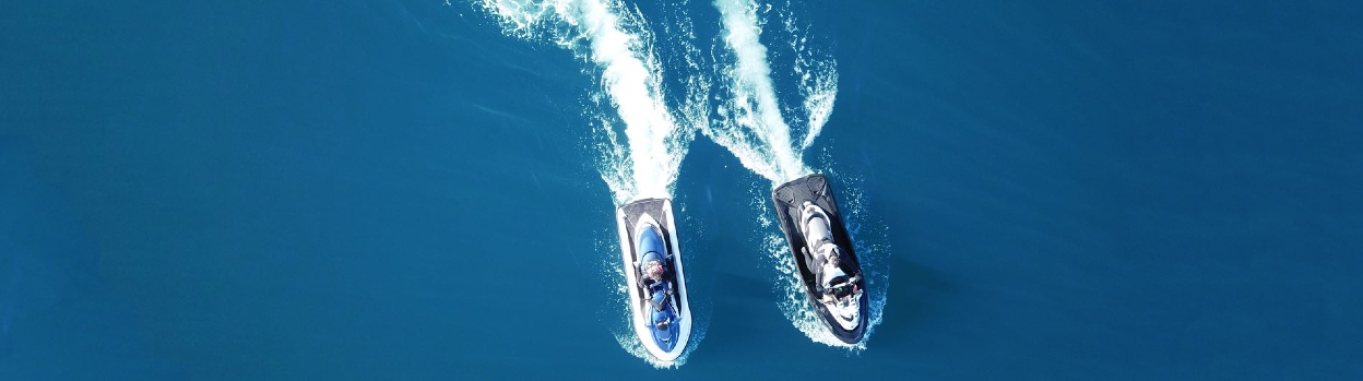 Aerial view of two jetskis at sea