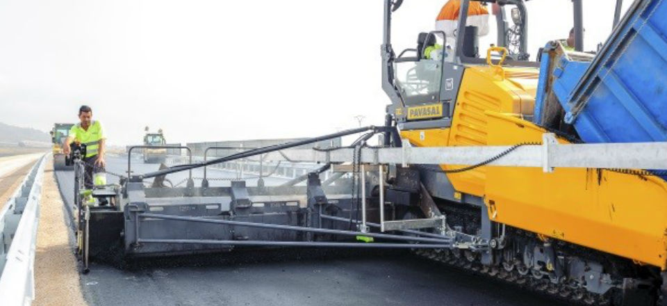 Worker and machinery working on the La Plana highway
