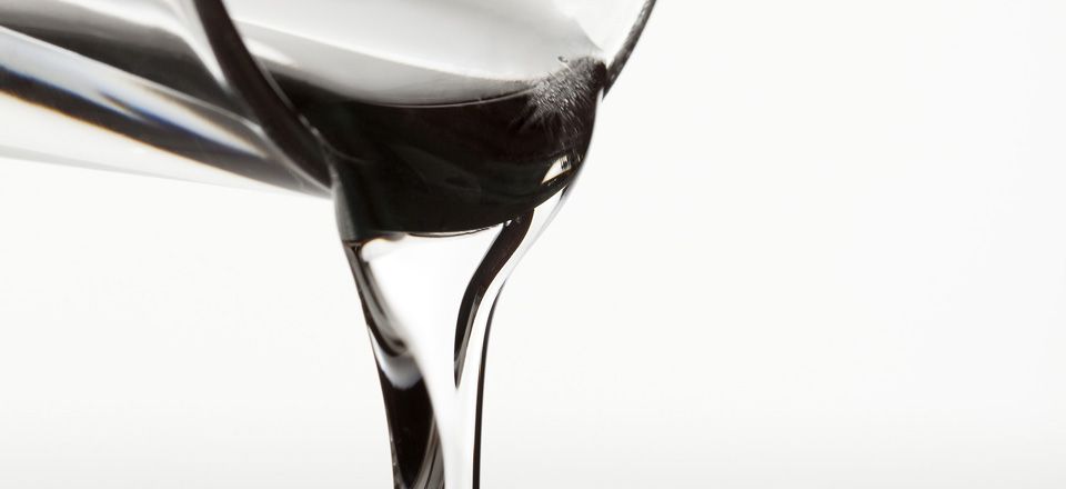 Clear liquid pouring from a container