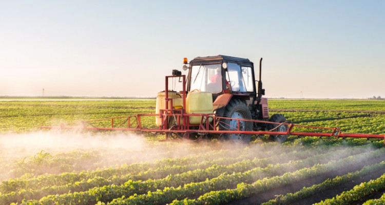 A tractor working in a field. Agriculture.