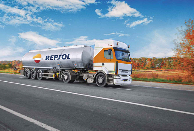 Repsol fuel truck driving on the road