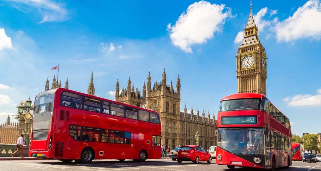 View of red double-decker buses in London, UK.
