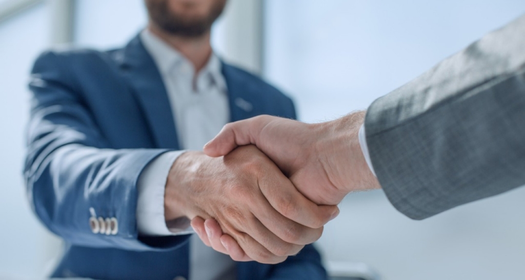 Two people shaking hands