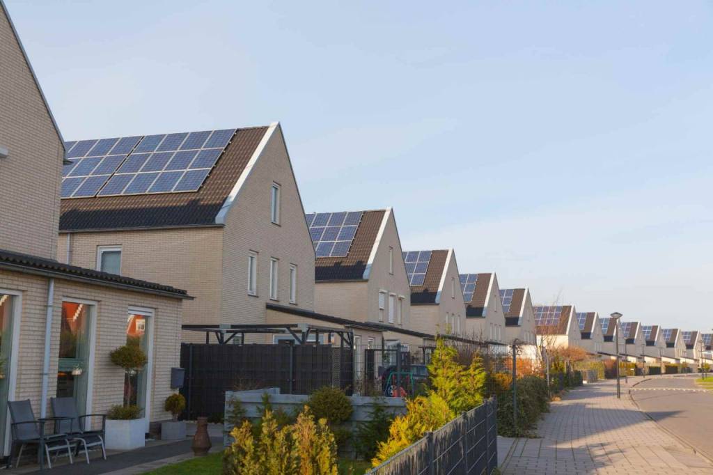 Row of houses with solar panels on the roof