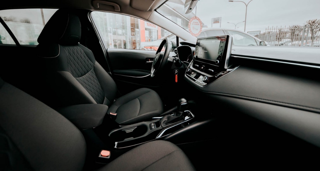 View of steering wheel and dashboard of a car