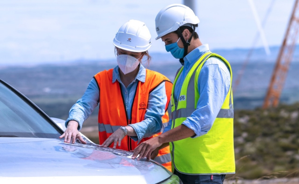 Two workers looking at documents