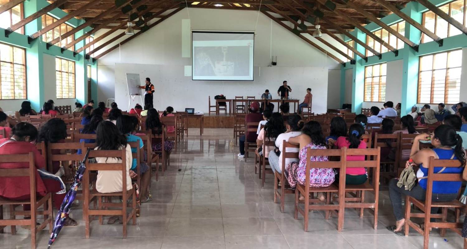 Una reunión de una comunidad en el lote 57