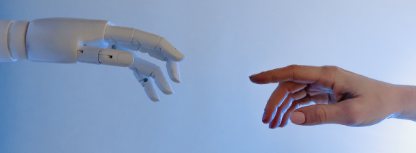 Robotic hand reaching for a human hand