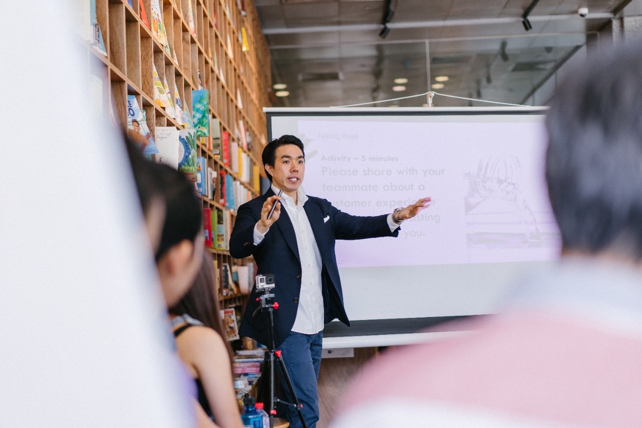 man coaching a class