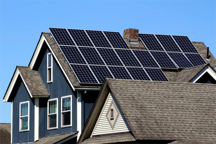 solar panels on the roof of a single family home